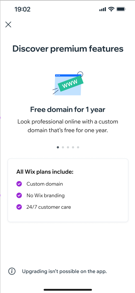 The new Wix premium upgrade screen — Discover premium features with Free domain for 1 year offer and the All Wix plans include list.